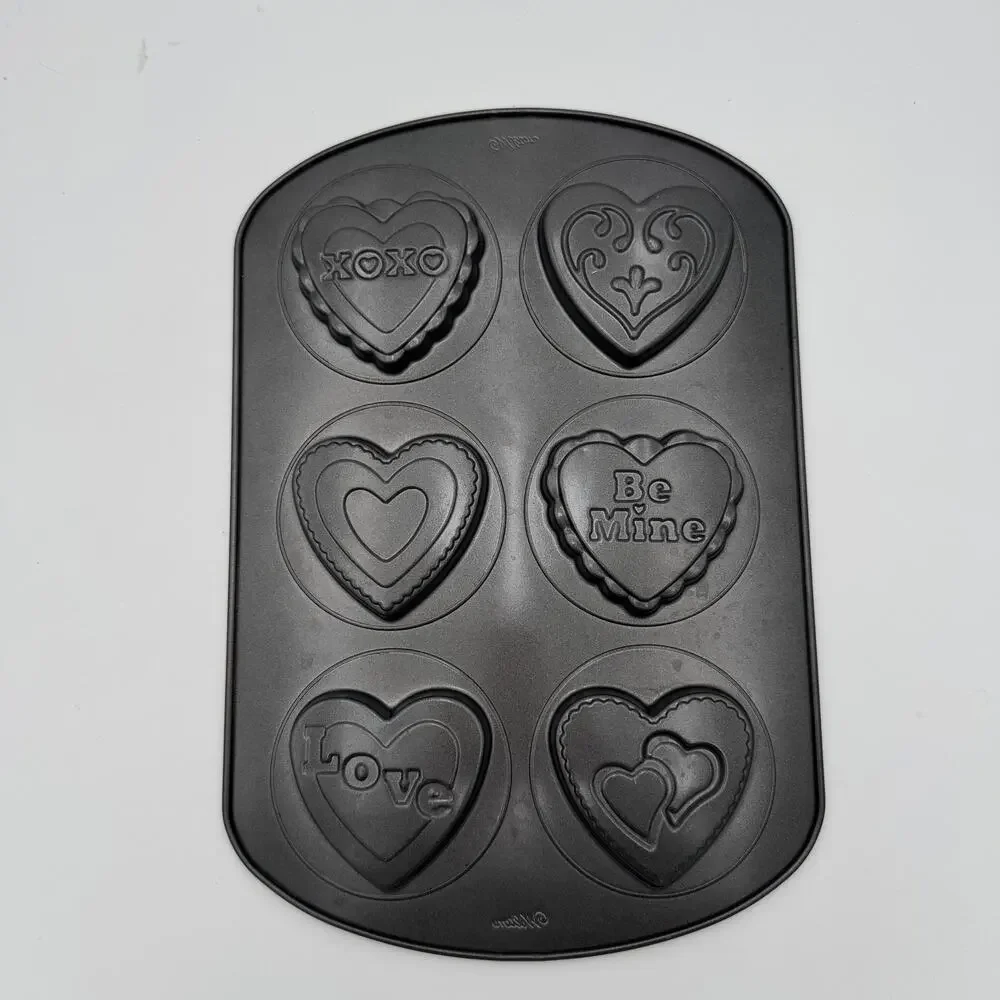 Set of 2 Wilton Gingerbread Man and Valentine Non-Stick Pans